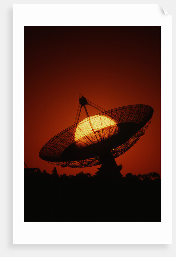 Radio Telescope Silhouetted by Setting Sun by Anonymous