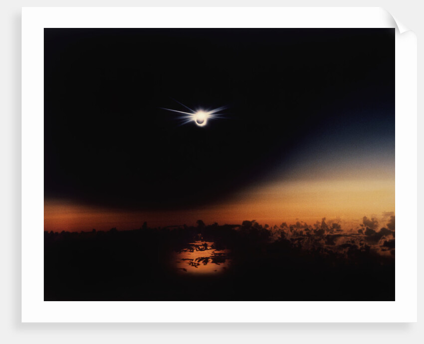 Solar Eclipse Seen from a Plane by Anonymous
