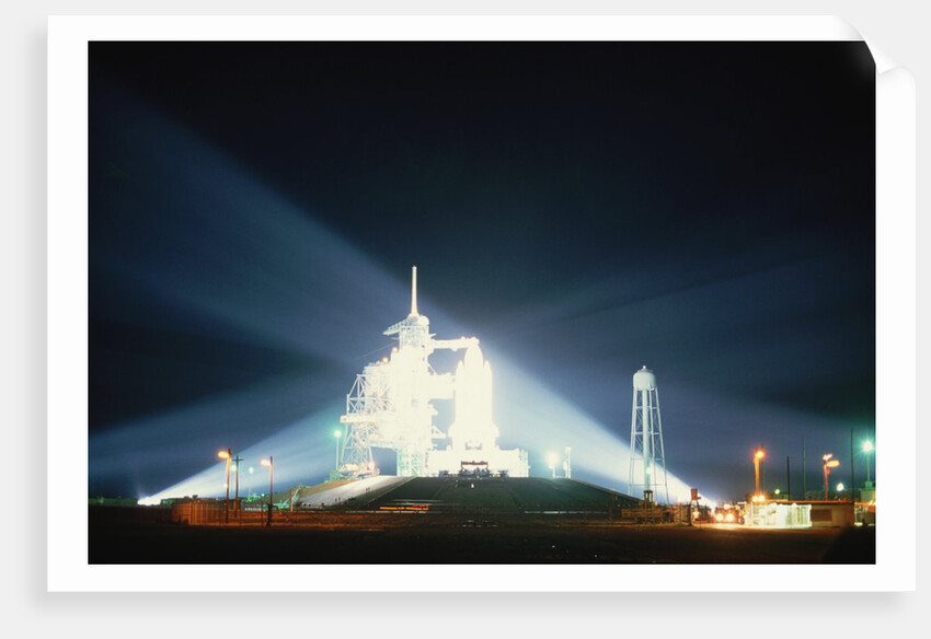 Space Shuttle Illuminated at Night by Anonymous