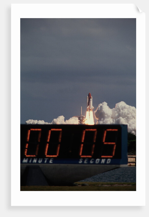 Space Shuttle Discovery Lifting Off and Countdown Clock by Anonymous