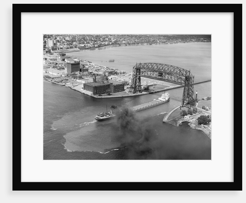 Cargo Boat Passing Under Bridge by Anonymous