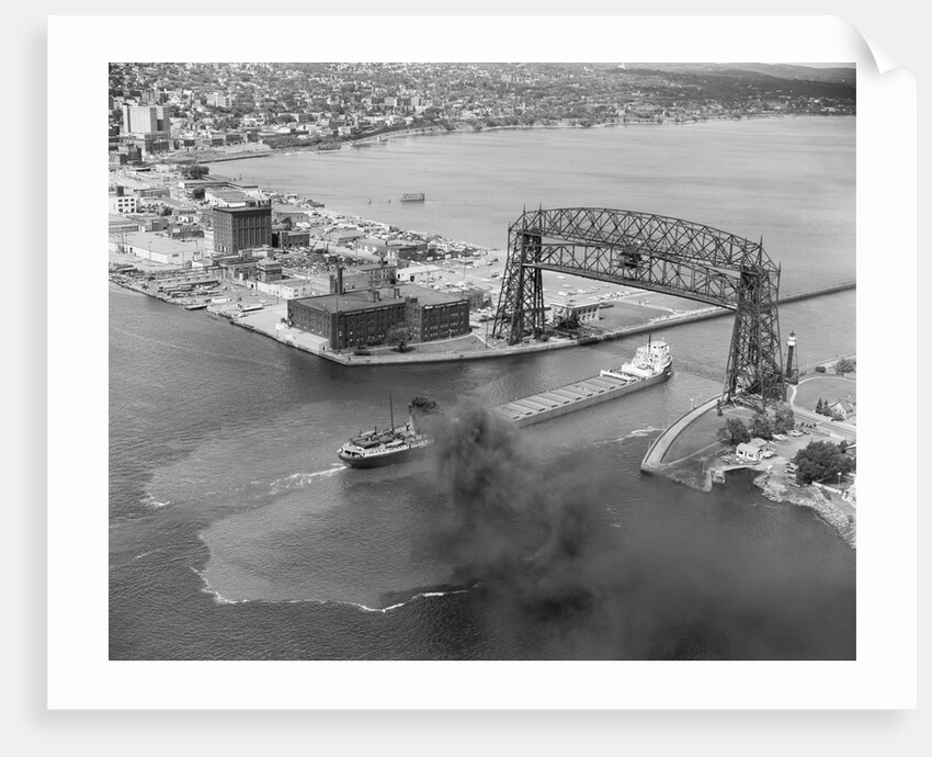 Cargo Boat Passing Under Bridge by Anonymous