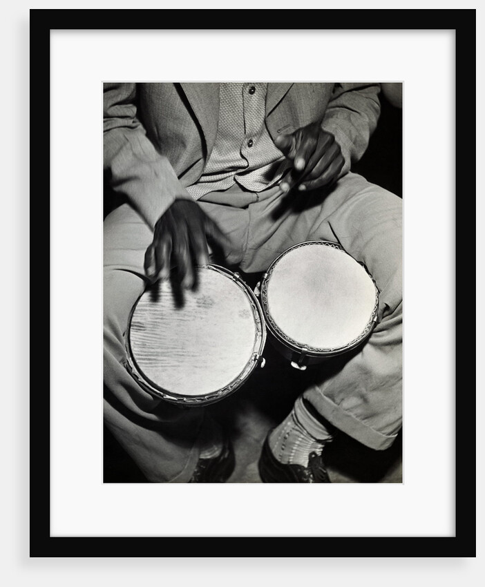 Man Playing the Bongo Drums by Anonymous