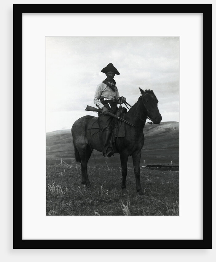 Cowboy on Horseback with Rifle by Anonymous