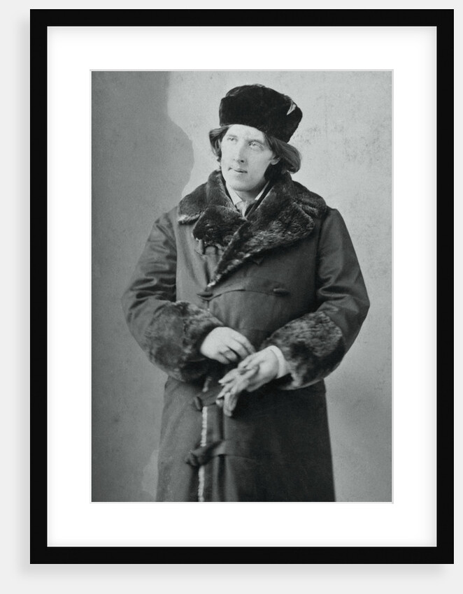 Portrait of Oscar Wilde Posing in Overcoat and Hat by Anonymous