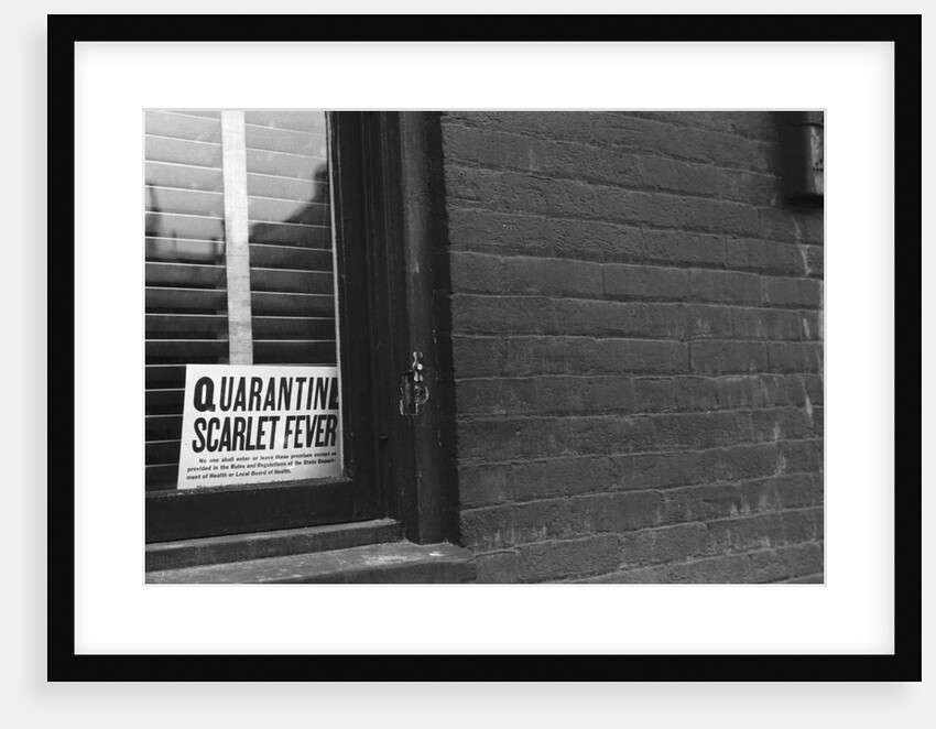 Sign Posted in Window of Building by Anonymous