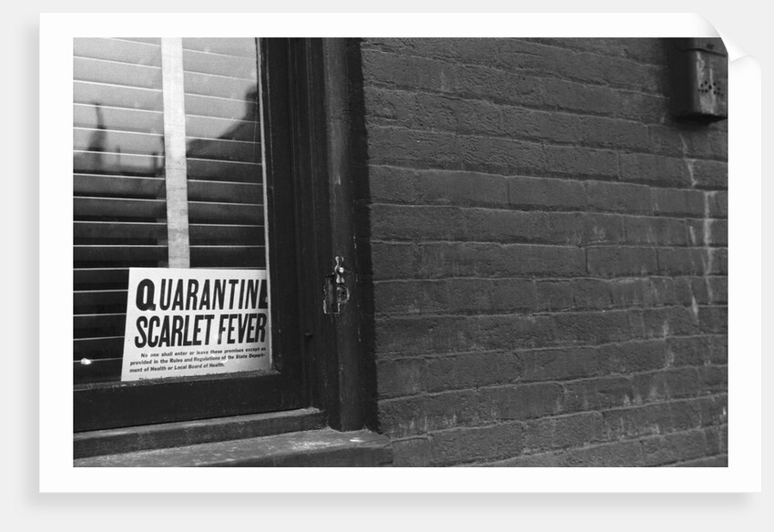 Sign Posted in Window of Building by Anonymous