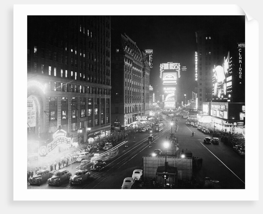 People Enjoying the Nightlife in Times Square by Anonymous