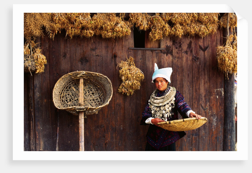 Miao Woman and Drying Produce by Anonymous