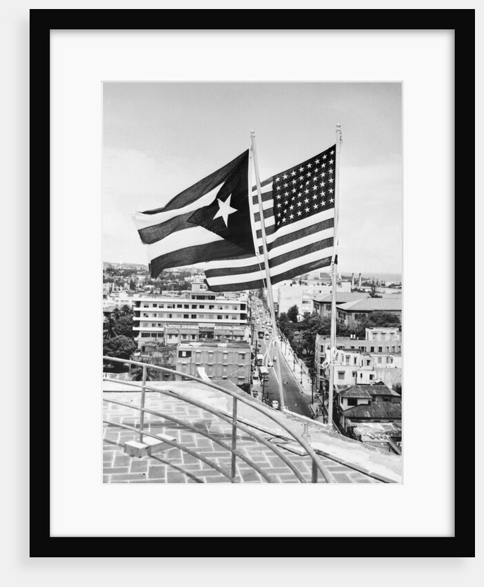 Flag of Puerto Rico Flying Alongside United States Flag by Anonymous