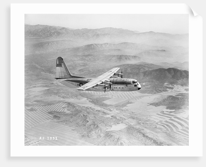 Airplane Flying Over Landscape by Anonymous