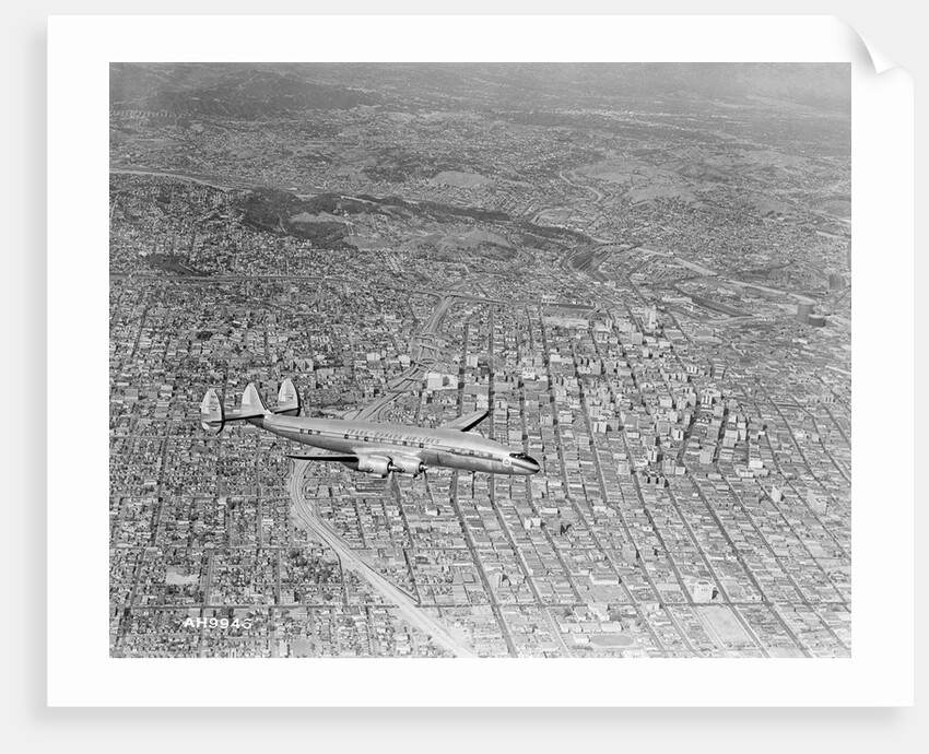 Airplane Flying Over Los Angeles by Anonymous