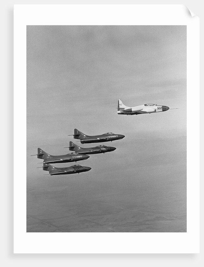 The Lockheed T2V-1 SeaStar Teaming up with the Blue Angels Stunt Team by Anonymous