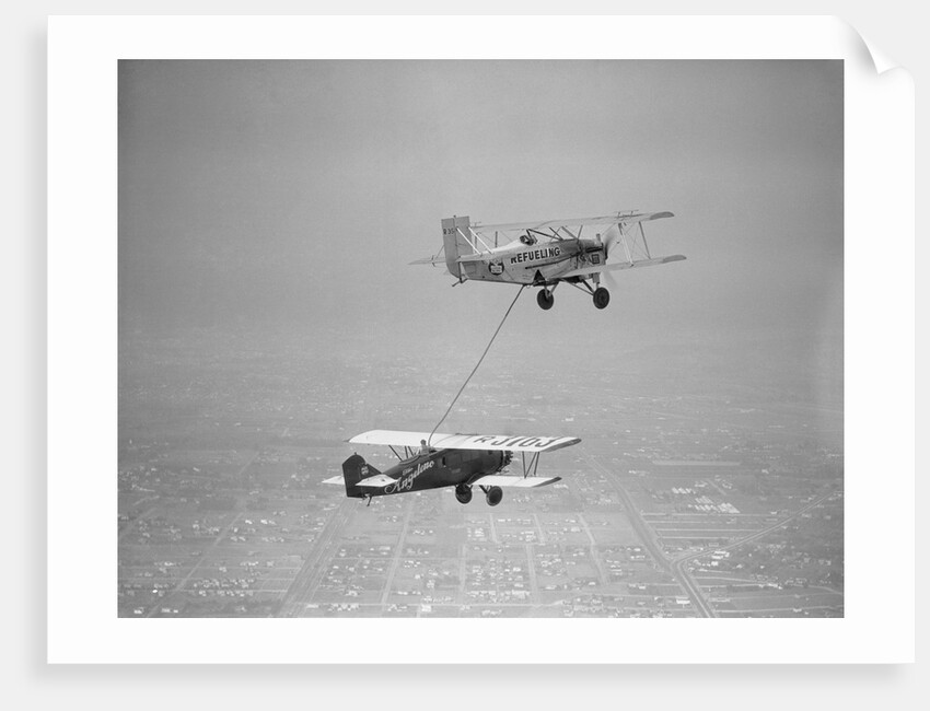 Airplane Refueling in Midair by Anonymous