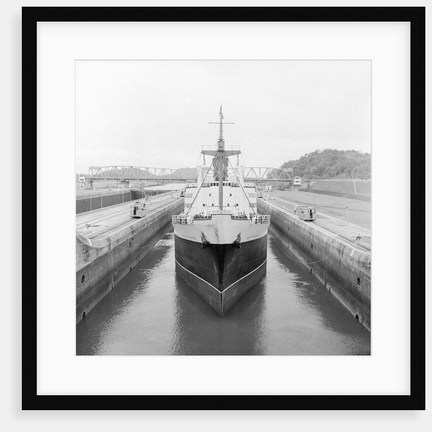 Ship Being Towed Through First Lock of Panama Canal by Anonymous