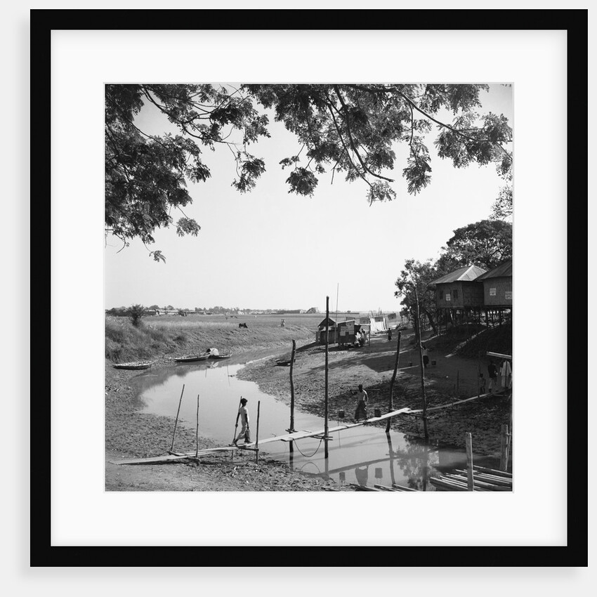 Villager Crossing Bridge over River's Stream by Anonymous