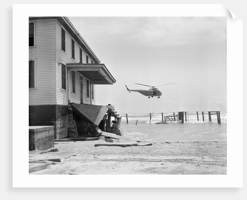 Helicopter Flying Over Storm Ridden Area by Anonymous