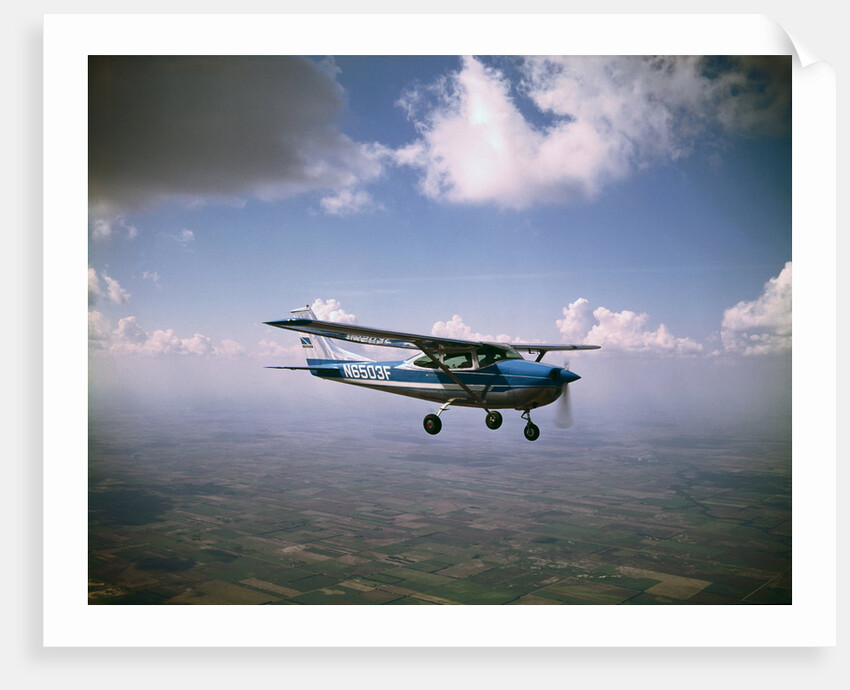 Cessna 182 Flying by Anonymous