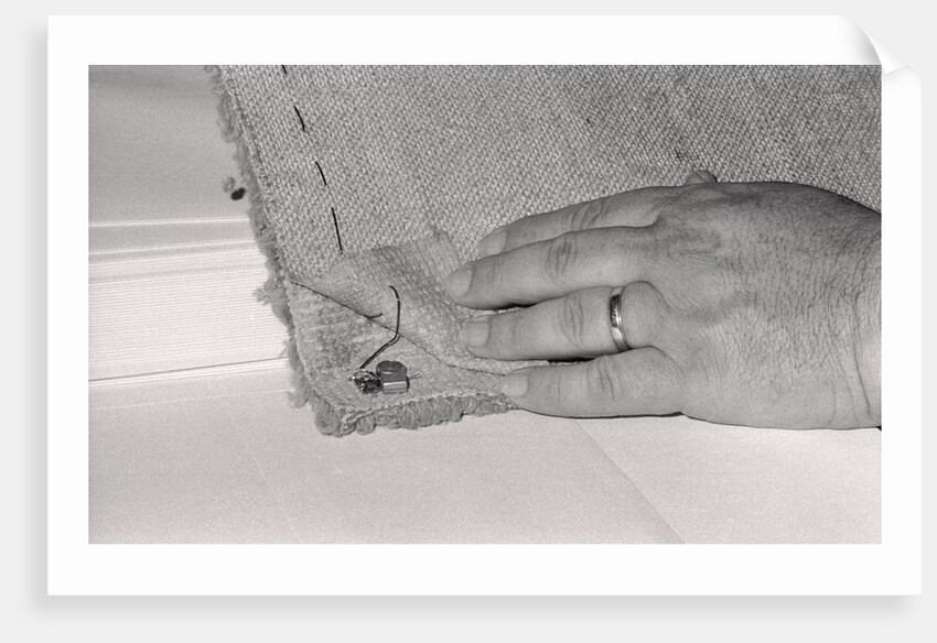 Bugging Device Sewn into Rug by Anonymous