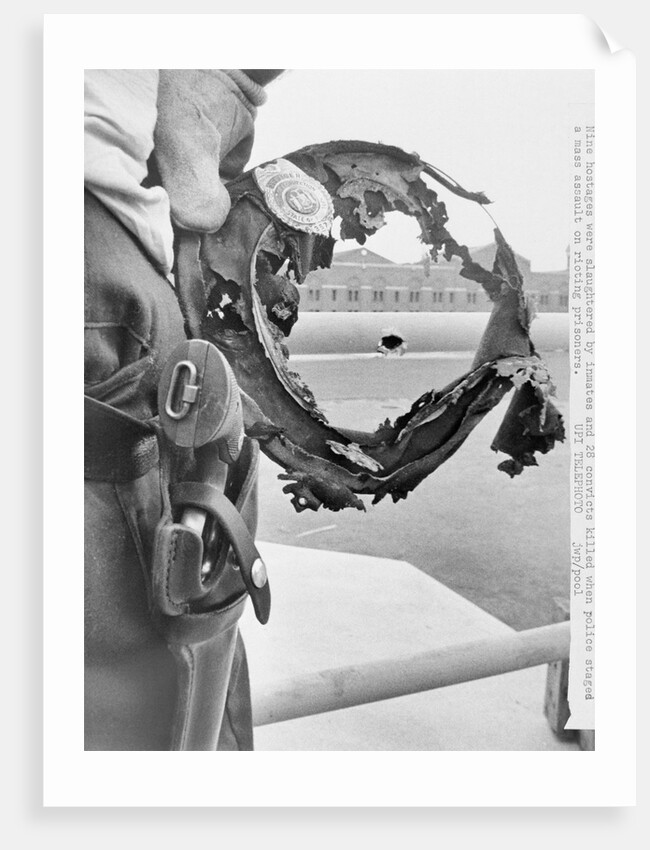 Burned Hat Framing Bullet Hole by Anonymous
