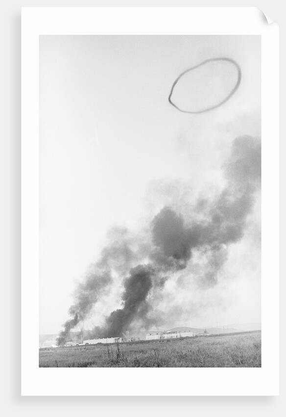 Smoke Ring Appearing Above Explosion by Anonymous