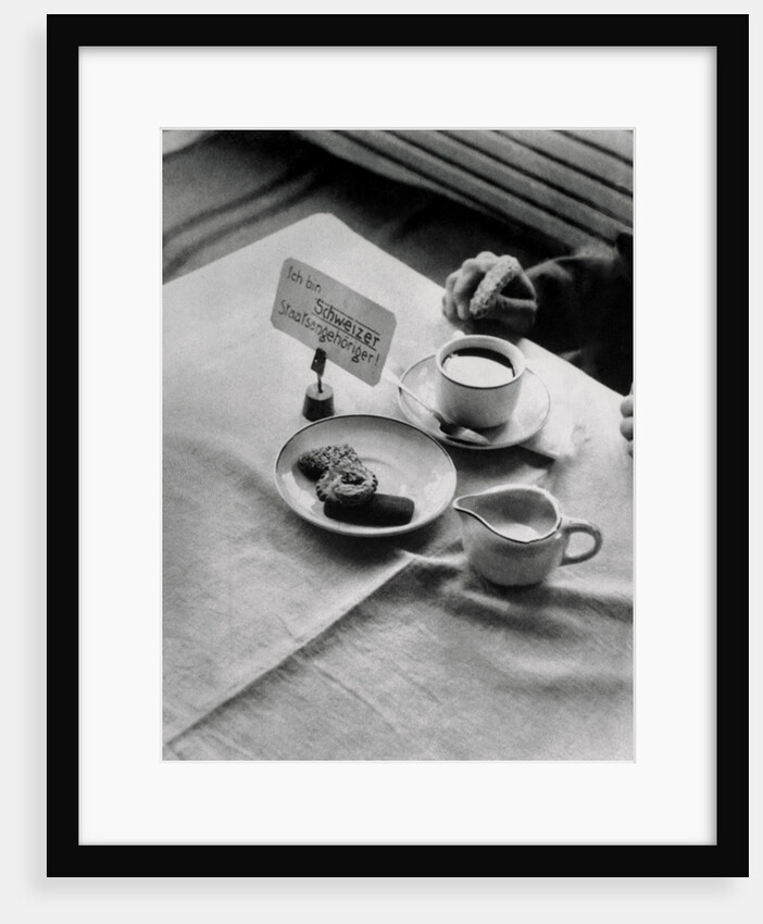 A Placard Being Placed on a Table by Anonymous