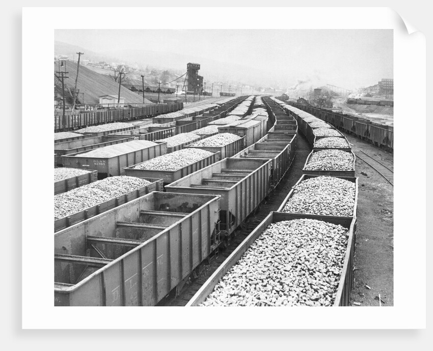 Train Cars Holding Coal Supplies by Anonymous