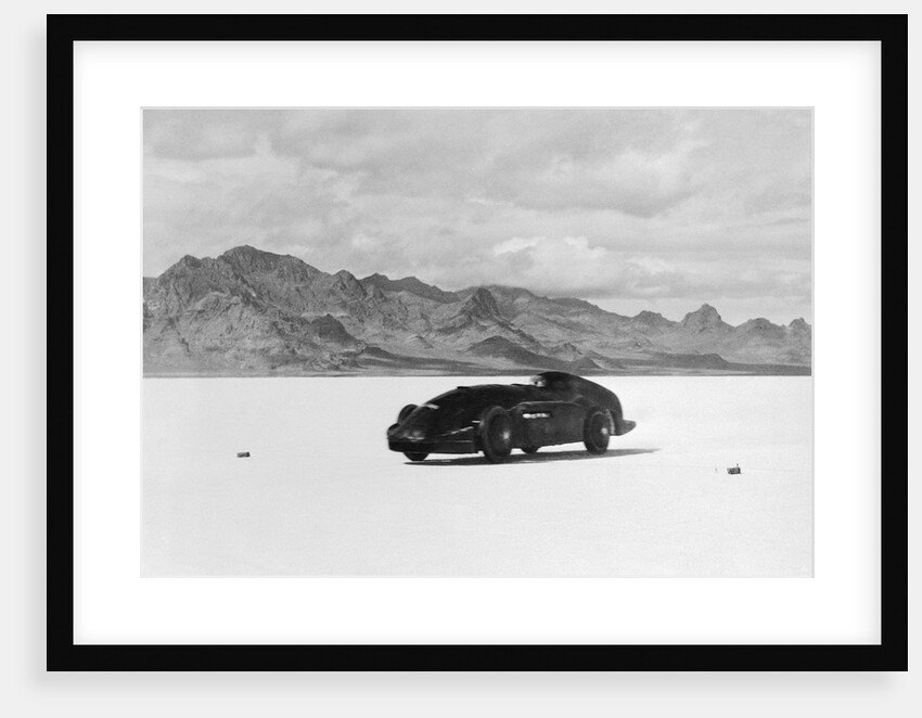 G.E.T. Eyston Breaking Speed Record in Automobile by Anonymous