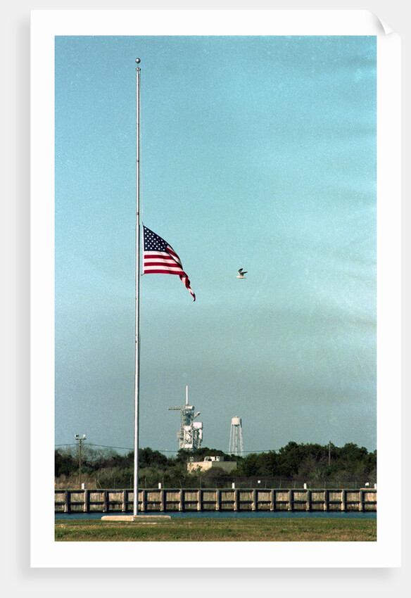 Space Center Lowering Flag by Anonymous
