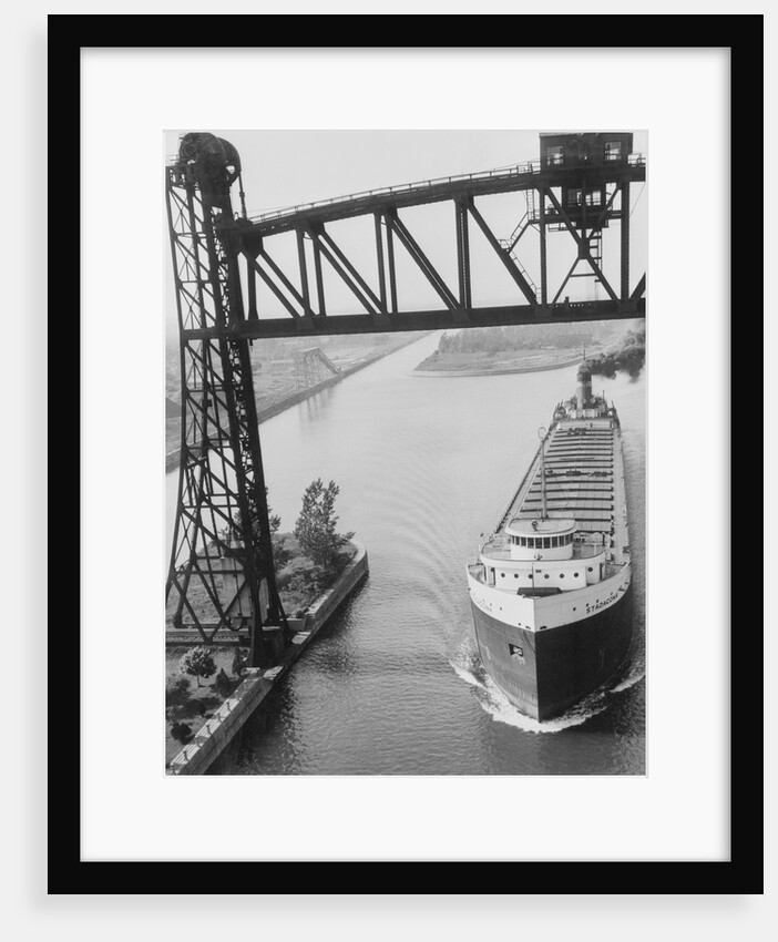 Boat Passing Underneath Rail Lift Bridge by Anonymous