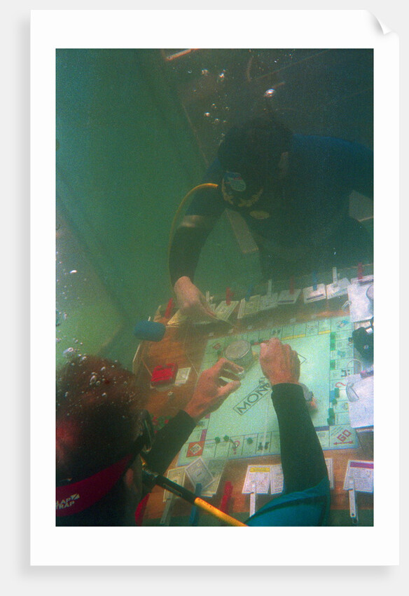 Divers Playing Monopoly Underwater by Anonymous