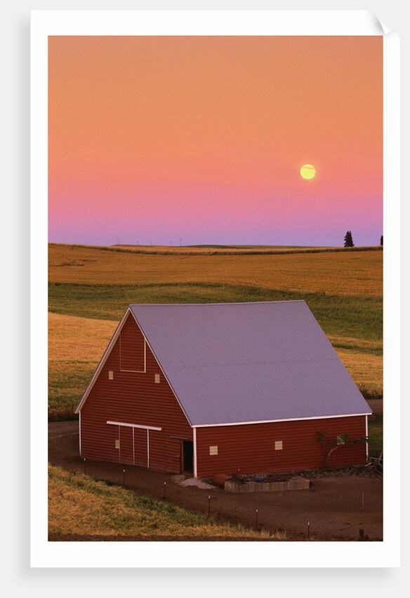 Sun Setting Behind Barn by Anonymous