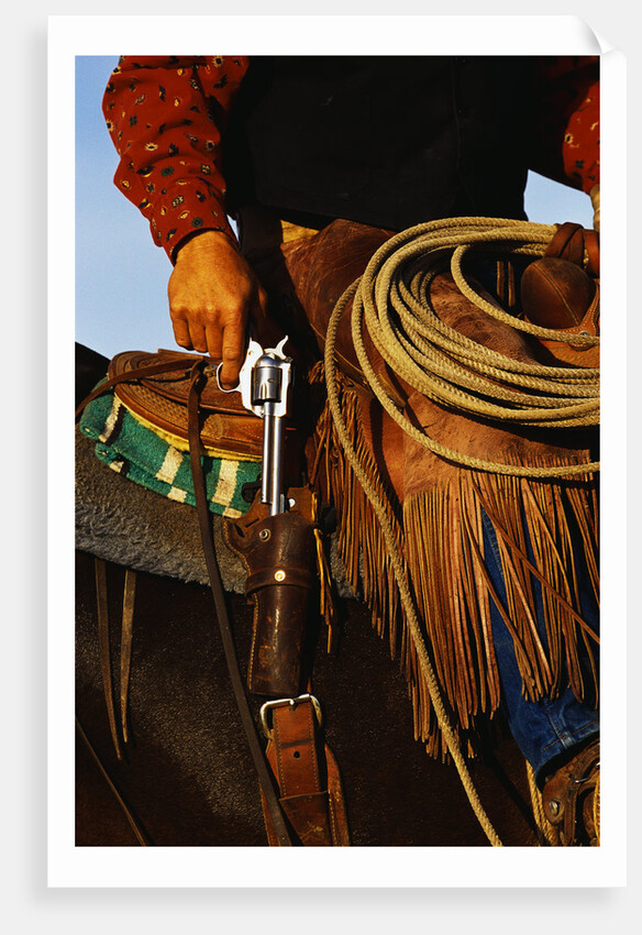 Close-up of Cowboy Holding Gun by Anonymous