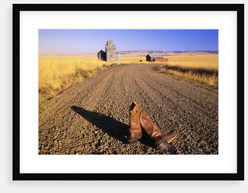 Cowboy Boots on Gravel Road by Anonymous