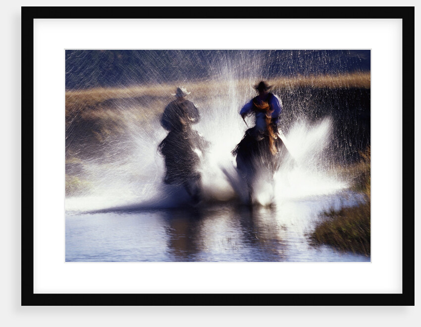 Cowboys Riding Horses Through River by Anonymous