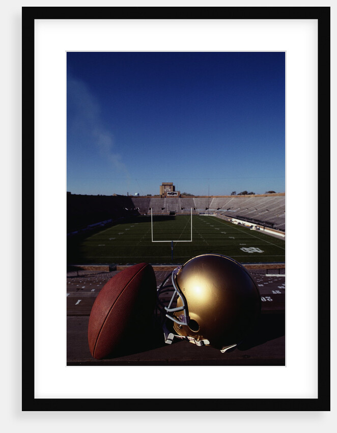 Notre Dame Football Helmet and Football at Notre Dame Stadium by Anonymous