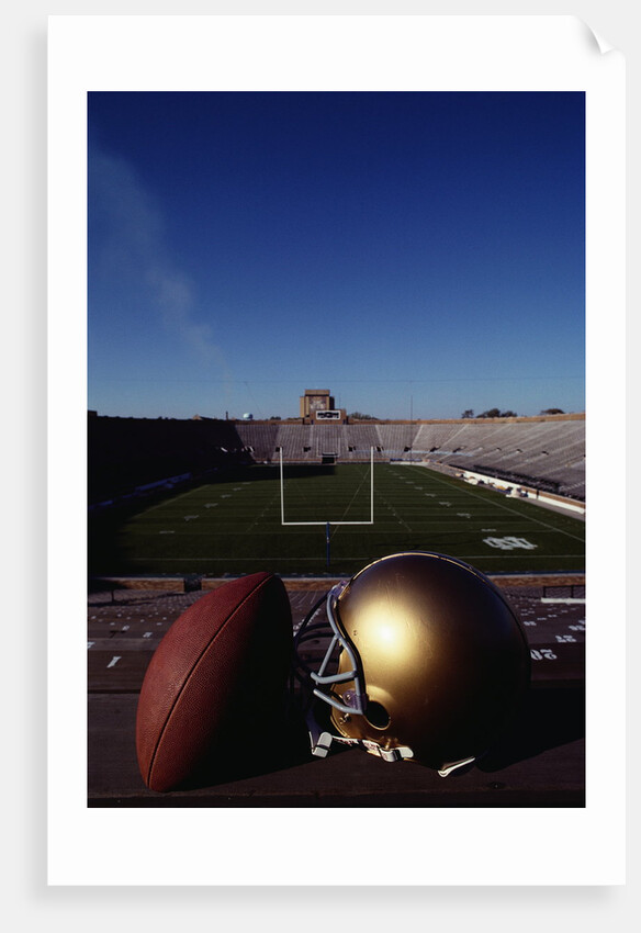 Notre Dame Football Helmet and Football at Notre Dame Stadium by Anonymous