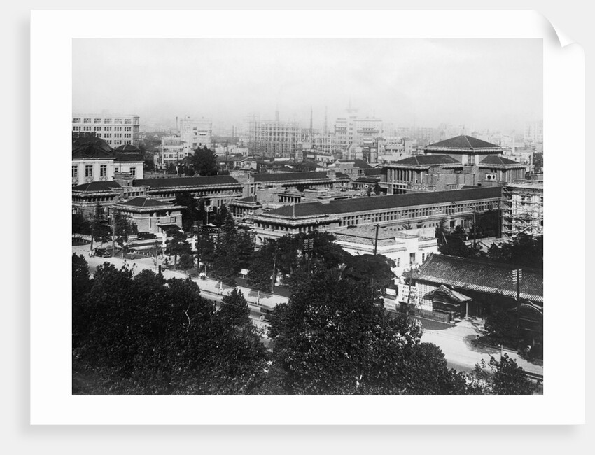 Rooftops and Tree Lines in Japanese City View by Anonymous