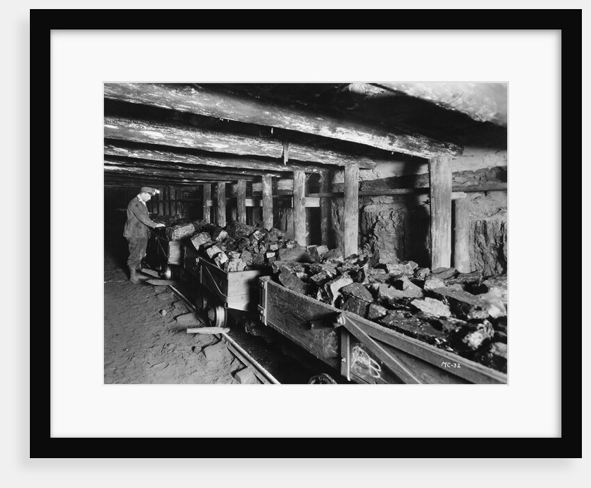 Miner Examining Load of Coal at Mouth of Pit by Anonymous