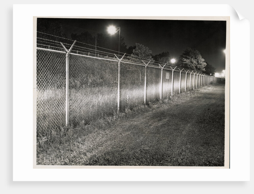 Metal Fence with Barbed Wire by Anonymous
