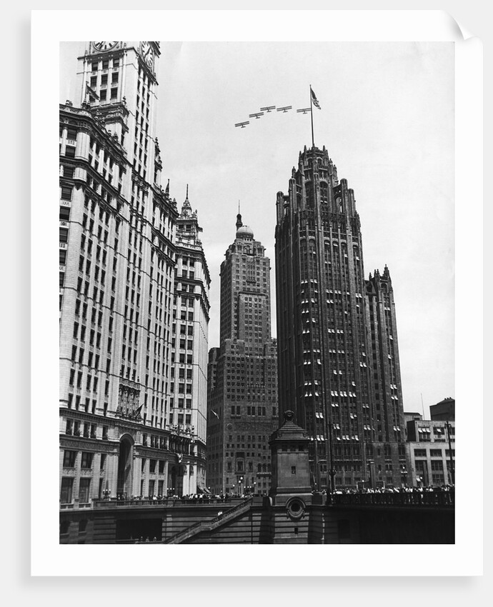 Planes Fly Over Buildings in Chicago by Anonymous