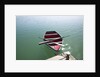 Rowing boat moored at the end of a jetty by Anonymous
