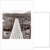 Wooden bridge over brook by Anonymous