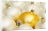 White Christmas tree decorations and a yellow one by Anonymous