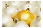 White Christmas tree decorations and a yellow one by Anonymous