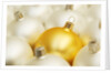 White Christmas tree decorations and a yellow one by Anonymous