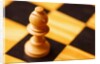 Pawn on chessboard by Anonymous
