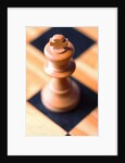 King chess piece on chessboard by Anonymous