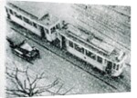 Urban traffic during snowfall, historic photo by Anonymous