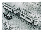 Urban traffic during snowfall, historic photo by Anonymous